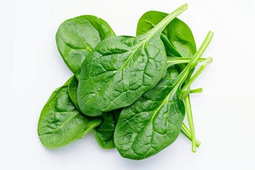 Fresh spinach leaves isolated on white background