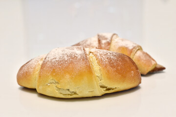 Two croissants ready to eat.