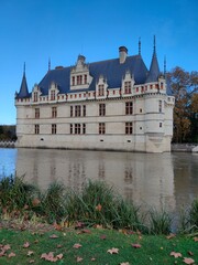 A castle with a body of water
