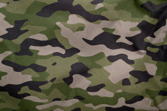 green woodeland army camouflage tarp texture , camo pattern background