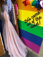 Rainbow closet with the message Let's come out of the closet 