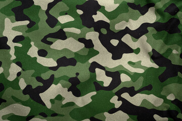 modern woodland green army camouflage tarp texture , camo fabric background © eric