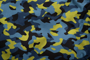 blue and yellow fashion army camouflage tarp texture , camo fabric background