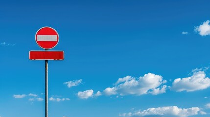 Blank road signs against blue sky