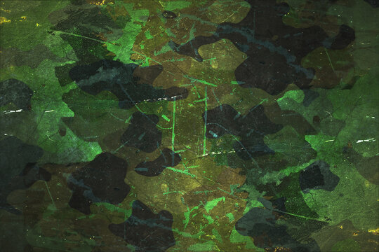 scratched camouflage painted metal surface