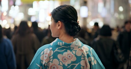 Back, city and Japanese woman in kimono on street with crowd for culture, heritage or tradition....