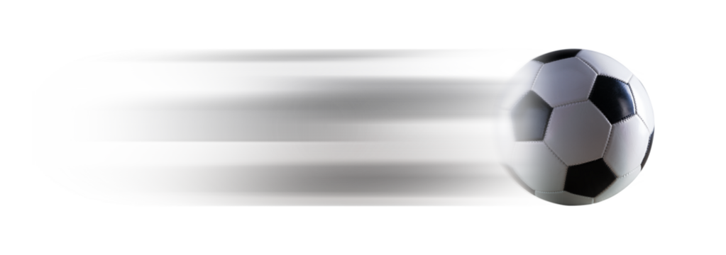 Fast soccer ball on green background