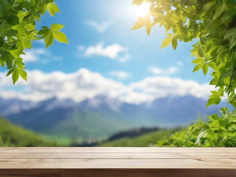 Scenic Table Background: Free Space for Your Decoration with Blurred Mountain Landscape, Blue Sky, Sunlight, and Green Foliage