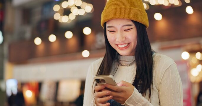 Phone, search and Japanese woman in city for travel, chat or map navigation outdoor. Smartphone, smile or happy lady person in Japan with app for location, guide or taxi, service or chauffeur request