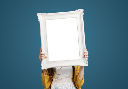 Beautiful woman posing and holding a frame