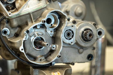 Vibrant snapshots capture the skilled artistry at a motorcycle repair workshop—mechanics in...