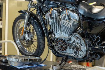 Vibrant snapshots capture the skilled artistry at a motorcycle repair workshop—mechanics in...