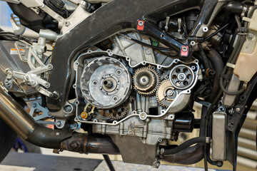 Vibrant snapshots capture the skilled artistry at a motorcycle repair workshop—mechanics in...