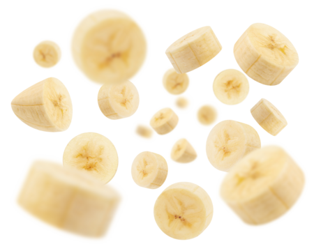 Flying banana slices from different angles isolated on a transparent background.