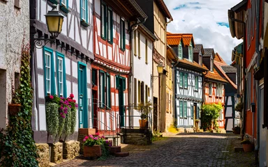 Foto op Canvas Idyllic old town panorama of Idstein in Hessen, Germany. Picturesque renovated truss houses with colorfully painted framework. The historic city center is a tourist attraction and protected monument. © ON-Photography