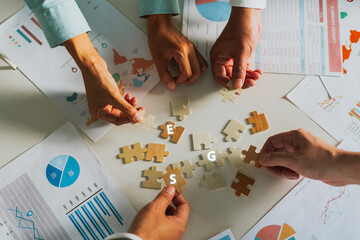 Business colleagues Trend analysis, brainstorming jigsaw puzzle ESG environment, Connecting...