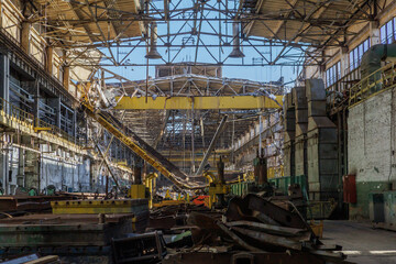 Destroyed and abandoned mechanical plant during war in Ukraine.