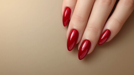 Beautiful red manicure on a gentle light background