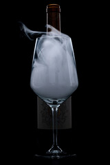 smoke filled wine glass bottle silhouette