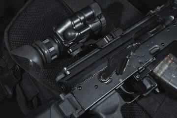 AKM assault rifle with gt14 night vision device, close-up photo.