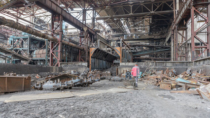 Destroyed workshop of cast iron plant during war in Ukraine.