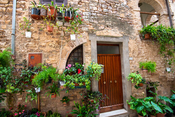 Fototapeta na wymiar Cobblestone Pedestrian Alley in Spello - Italy