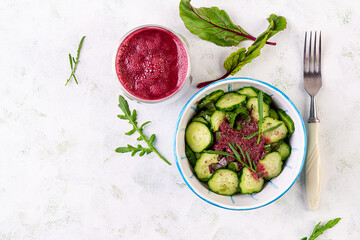 Cucumber salad with beet smoothie. Vegetarian cuisine. Diet menu. Losing weight. View from above