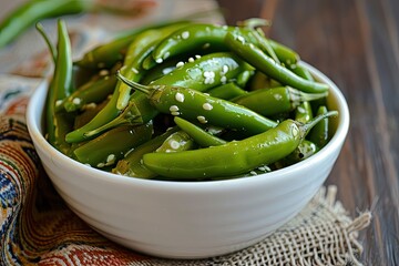 Green chillies pickled at home in a bowl