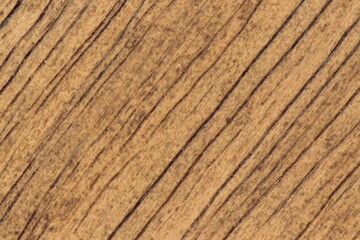 Fragment of a wooden board close-up