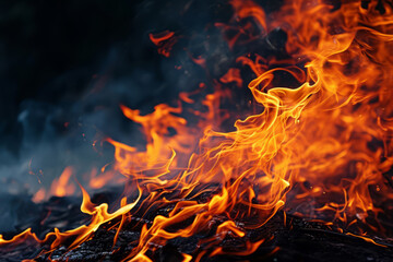 Fire flames on dark background. Burning flame effect