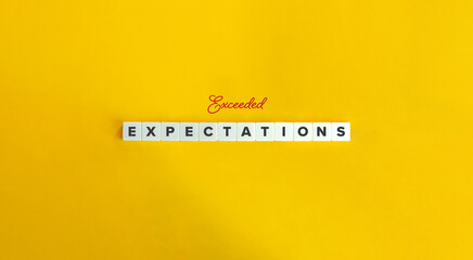 Exceeded Expectations Concept Image. Letter Tiles on Yellow Background. Minimalist Aesthetics.