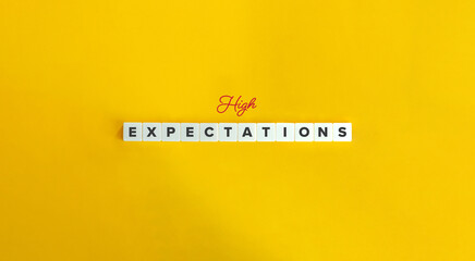 High Expectations Phrase. Letter Tiles on Yellow Background. Minimalist Aesthetics.