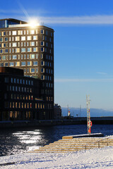 Modern buildings on sunny winter day at waterfront in Malmo in Sweden - 712233796