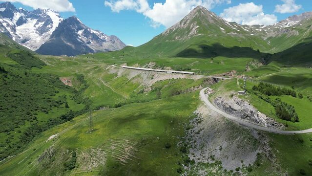 Col du Lautaret Mountain Pass Road in French Alps, France - Aerial 4k