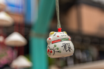 Ceramic cat decorates the tree