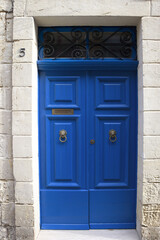 Wooden blue door in downtown of Rabat, Malta