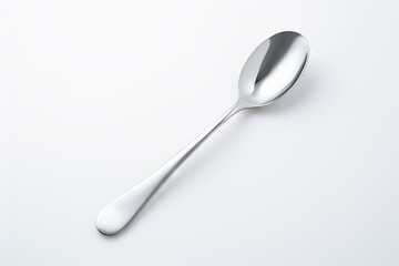 Silver shiny spoon isolated on white surface