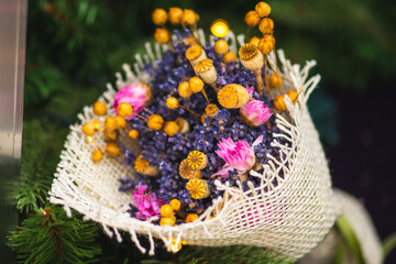 Bouquet of various flowers for greetings with a composition of lavender, poppy flowers and pink,...