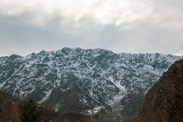 beautiful concentrated Rocky Mountains in a winter season with a huge carpet of snow in Tajikistan