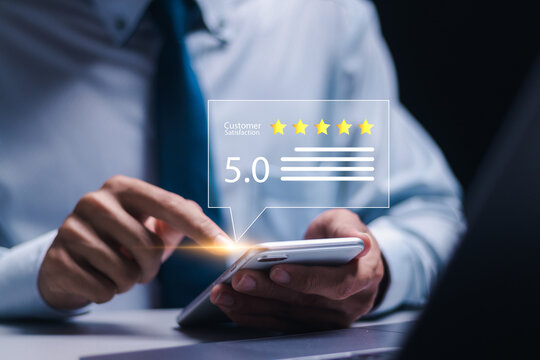 Customer Satisfaction Survey concept, Customers use smartphone give excellent five-star ratings for service experience rating online application, satisfaction feedback review, good quality most.