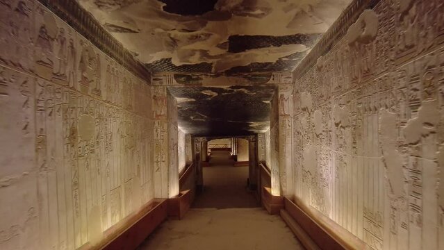 Luxor, Egypt - November 25 2023: Point of view of a tourist who walks into the interior of the famous Seti the first tomb in the valley of Kings in Luxor in Egypt. 