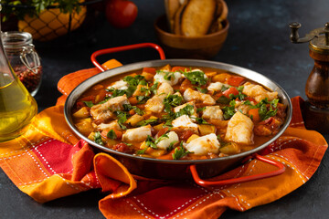 Traditional Portuguese fish stew. Cod stew.