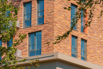 Fototapeta na wymiar Facade of a modern residential building, building texture