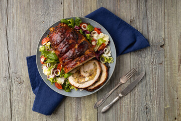 Stuffed turkey breast. Roasted whole, served with fresh vegetables.