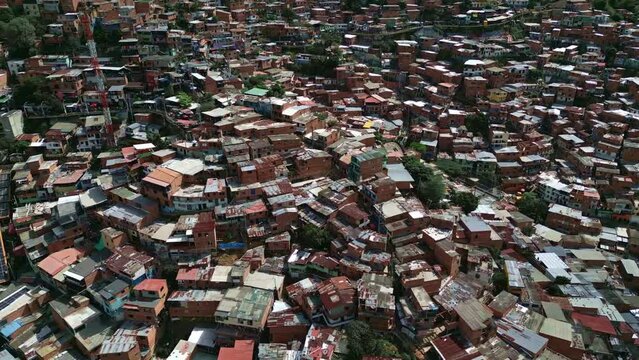 Arc Drone Shot of Comuna 13 Neighborhood, Medellin, Colombia. Traditional Brick Houses