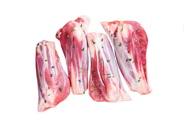 Fresh Raw lamb shanks meat with herbs and pepper.  Transparent background. Isolated.