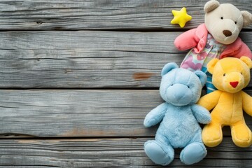 Stuffed baby toys on wooden backdrop blank area available