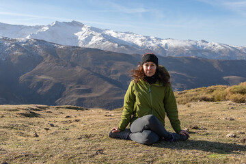 Naklejka premium Peaceful Meditation in Baddha Konasana with Mountain View