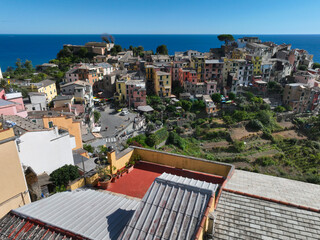 Manarola Village Cinque Terre Coast Italy. colorful town in Liguria one of five Cinque Terre. Manarola traditional Italian village in the National park Cinque Terre, with multicolored houses on rock