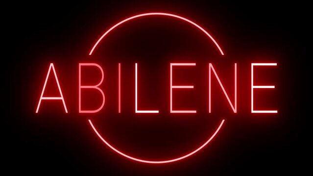 Flickering red retro style neon sign glowing against a black background for ABILENE